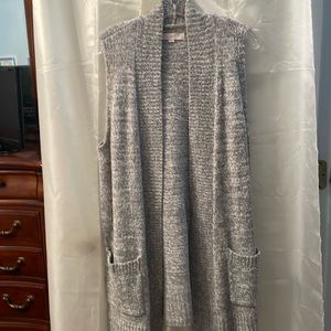 Grey white long sleeveless vest